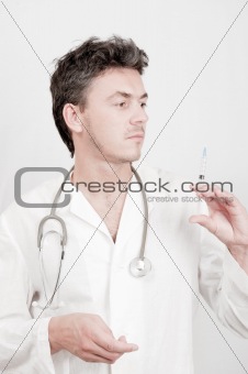 pretty male doctor with medical stethoscope
