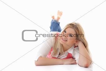 young casual smiling woman lying on the floor isolated on white 