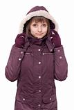 Girl in winter violet hooded jacket