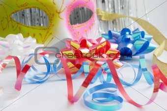 carnival mask and decorative bows
