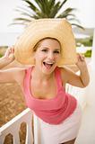 Portrait of young sexy crazy summer woman in large hat relaxing 