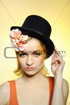 Elegant fashion woman with creative eye make-up.