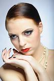 Young elegant beauty female face with red shiny lips