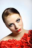 Young elegant beauty female face with red shiny lips
