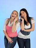 two Pretty casual woman speaking on the phone 
