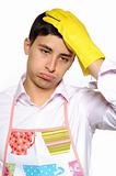Expressions.Tired man in yellow glove for washing dishes