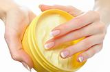 Beautiful hands with perfect nail french manicure, cream