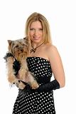 Beautiful blong girl holding small cute york terrier dog.