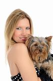 Beautiful blong girl holding small cute york terrier dog.