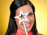 Beautiful woman with creative make-up and the star making a wish