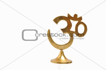 Figure of golden indian symbol aum. isolated on white background