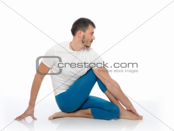 Handsome active man doing yoga fitness poses. isolated on white 