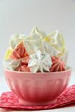 colorful meringue  beze cookies in a cup