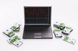Black Laptop with chart and stacks of euros 3d