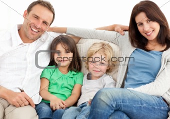 Portrait of a family on the sofa