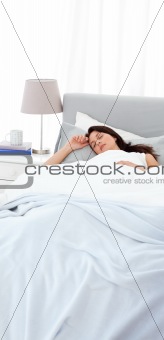 Serene mother sleeping peacfully on the bed