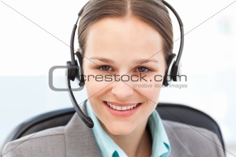 Portrait of a friendly operator with earpiece