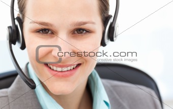 Portrait of a pretty operator with earpiece
