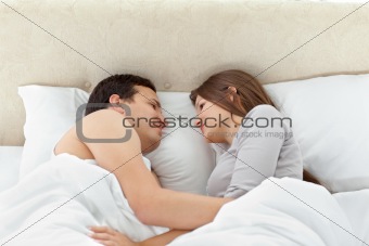 Peaceful lovers sleeping together at home
