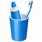 brushing teeth and toothpaste in a cup