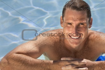 Handsome Middle Aged Man Relaxing In Swimming Pool 