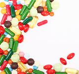 Colorful pills on white background 