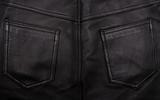 Pockets on the black leather texture