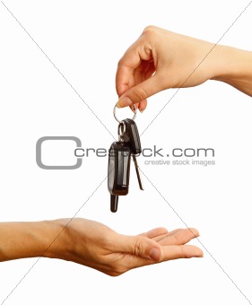 Female hand holding a car key