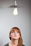 portrait of a young woman and a lamp 