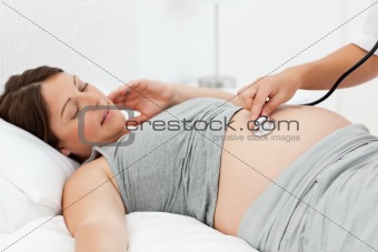 Pregnant woman with a nurse