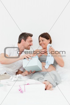 Woman offering a gift to her wife