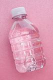 Bottled Water on a Pink Background