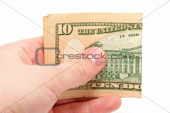 Hand holds a 10 dollar bill