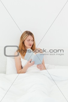 Beautiful girl reading a book