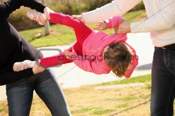 Two adults fighting for a child