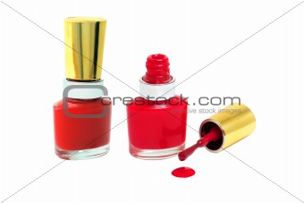 Spilled Red Nail Polish with brush isolated on white