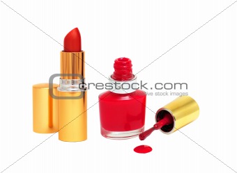 Spilled Red Nail Polish and Red Lipstick isolated on white
