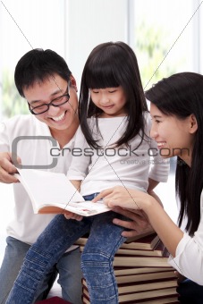 Happy asian family studing together.