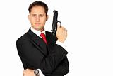 A secret agent posing with his gun