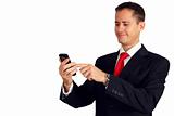 Handsome young man in a suit navigating on his smartphone