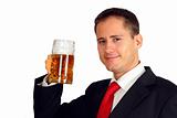 Handsome young man in a suit toasting with a beer