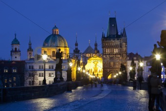 czech republic prague - charles bridge and spires of the old town at dusk