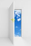 Open door with cloudy blue sky behind it