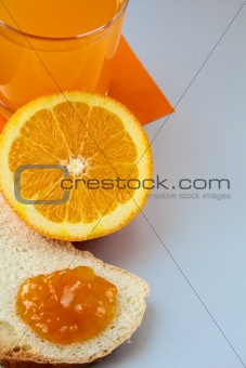 orange, juice and toast with orange marmalade