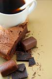cup of coffee and chocolate cake