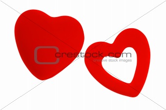 Two red textile hearts isolated on white