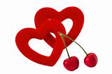 Two red textile hearts and cherry isolated on white