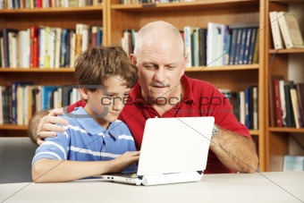 Student and Teacher on Computer