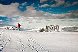 Man climbs on a snow slope