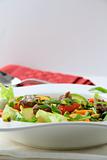 salad with vegetables and meat grilled